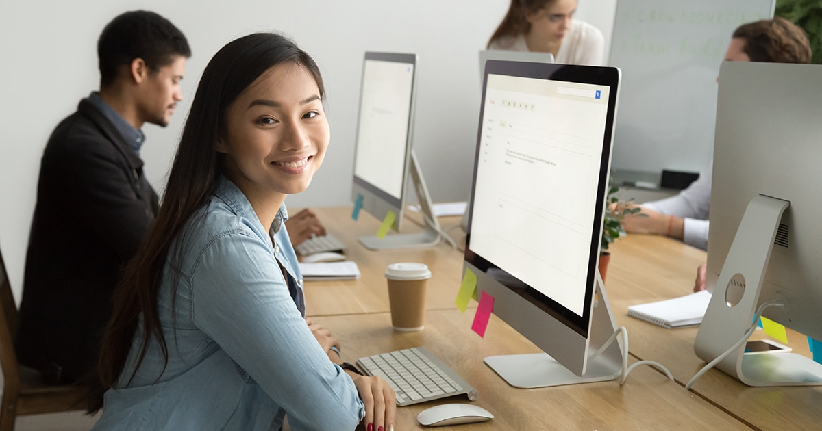 Asian girl by computer