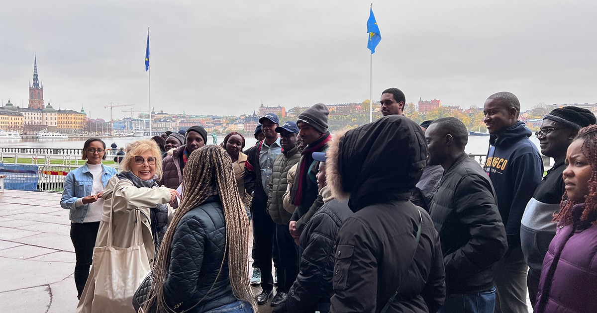 Participants and guide during sightseeing in Stockholm.